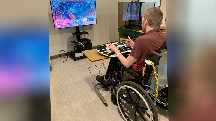 A new adaptive gaming program at Foothills Medical Centre provides patients like Karl Sawatzkoi with a fun and therapeutic outlet for healing.