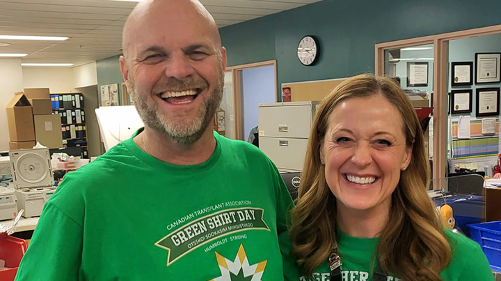 Anne Halpin, who received a donor medal for her gift of life to a stranger, poses with her friend, Sean Delaney, who inspired her living donation.